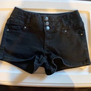 Black denim shorts.
